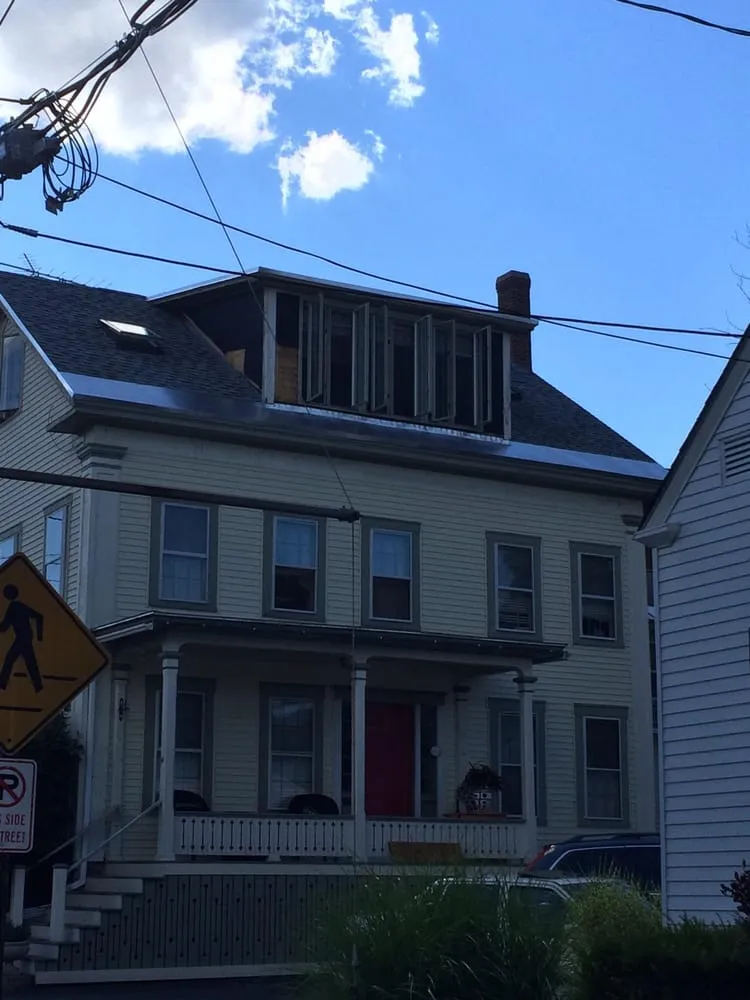 Slide of New Heights Roofing