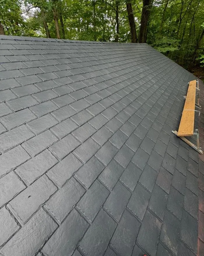 Slide of New Heights Roofing