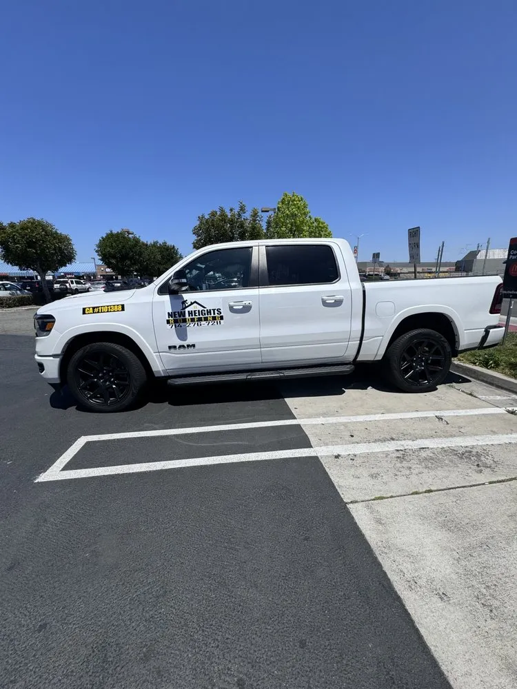 Slide of New Heights Roofing