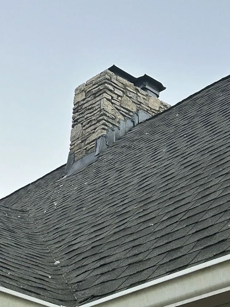 Slide of New Look Roofing