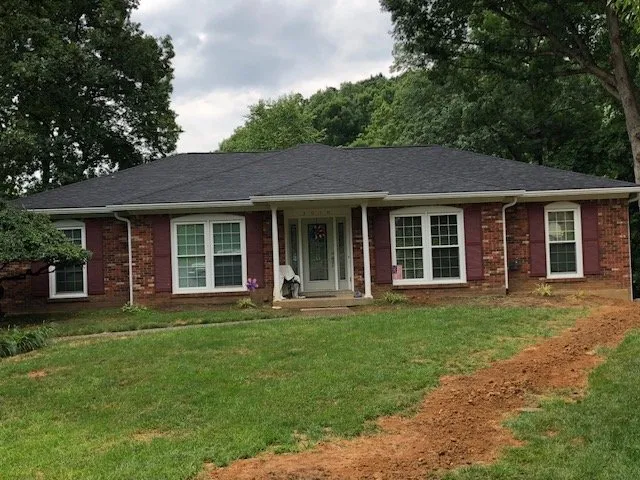 Slide of New Look Roofing