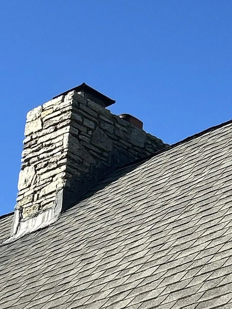 Slide of New Look Roofing