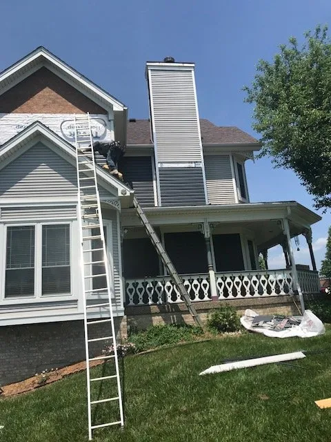 Slide of New Look Roofing