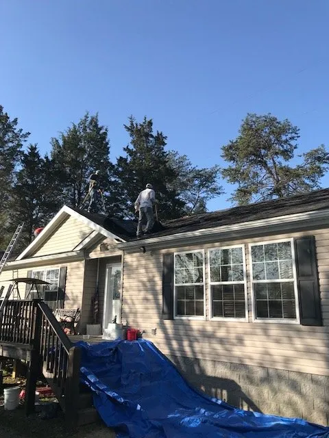 Slide of New Look Roofing