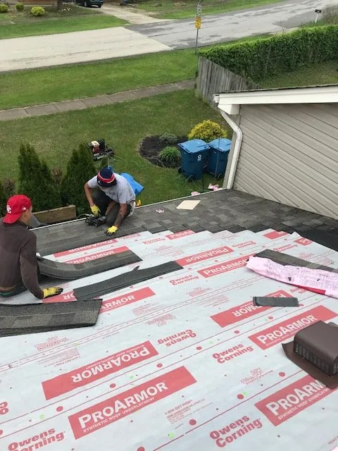 Slide of New Look Roofing