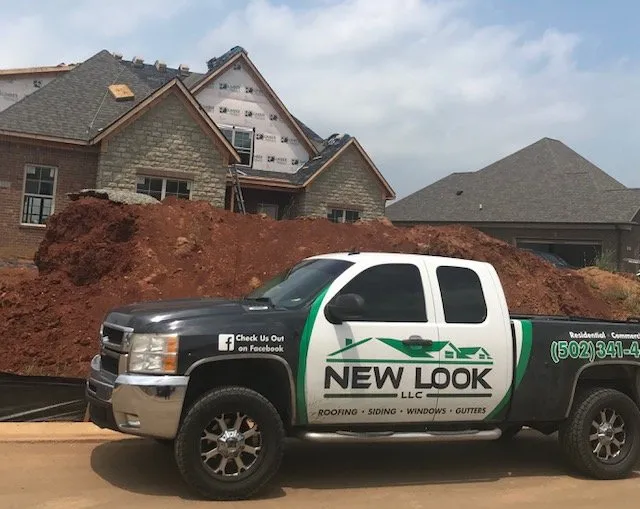 Slide of New Look Roofing