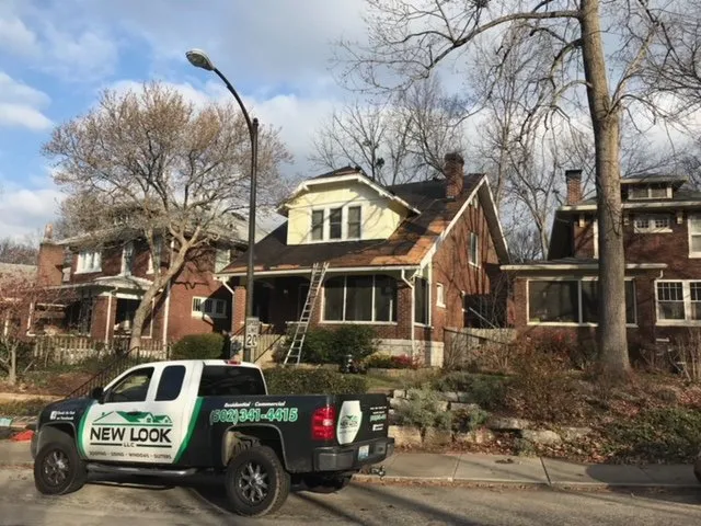 Slide of New Look Roofing