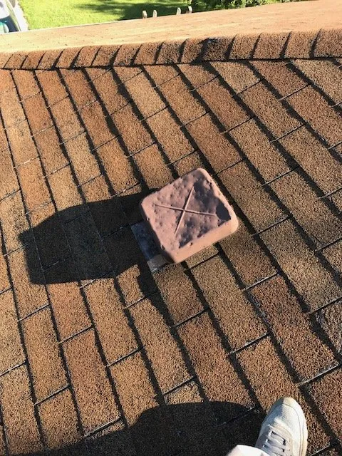 Slide of New Look Roofing