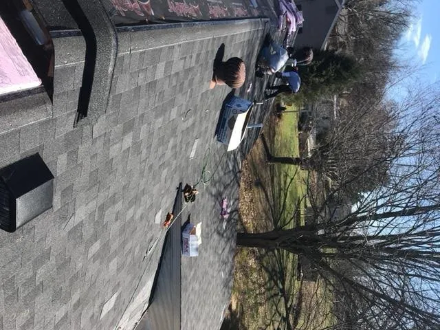 Slide of New Look Roofing