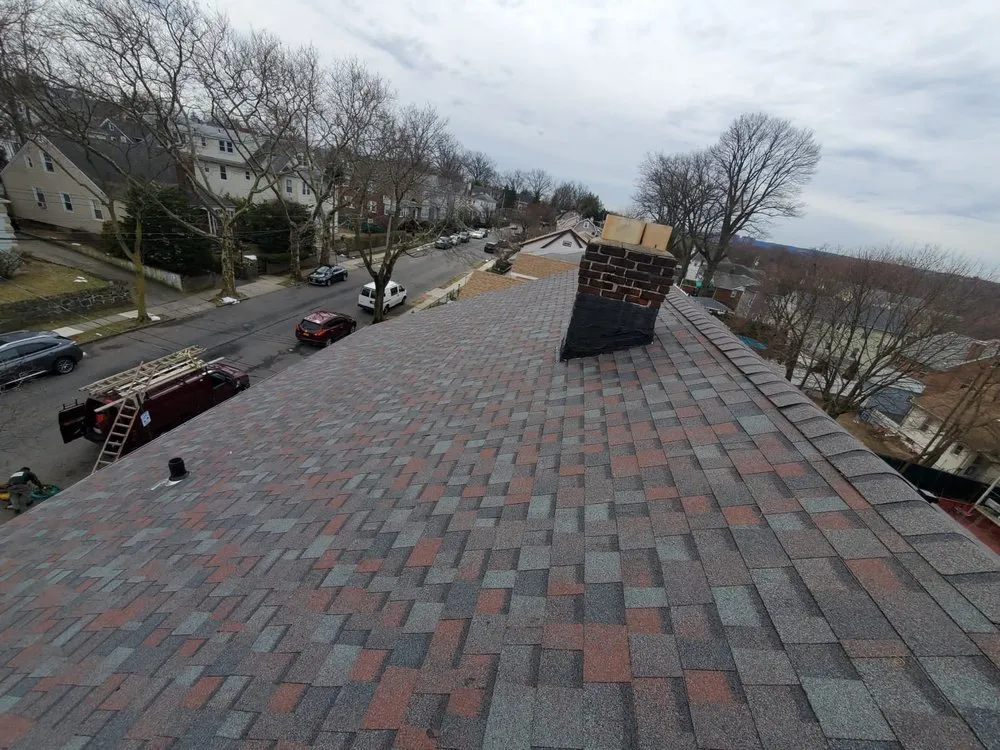 Slide of New Look Roofing