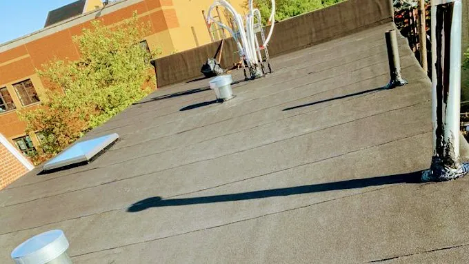 Slide of New Look Roofing