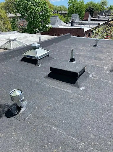 Slide of New Look Roofing