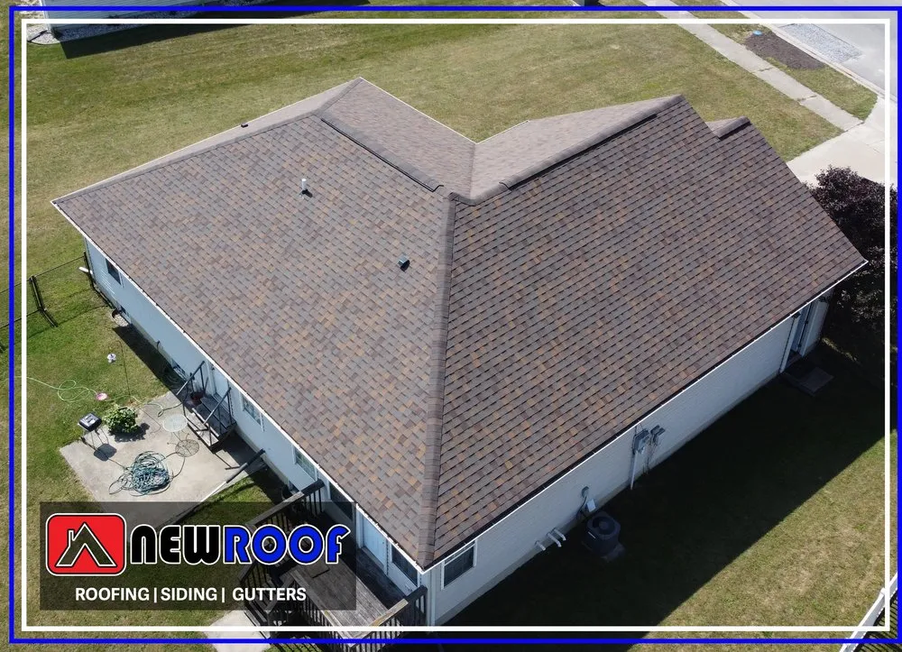 Slide of New Roof Roofing & Restoration