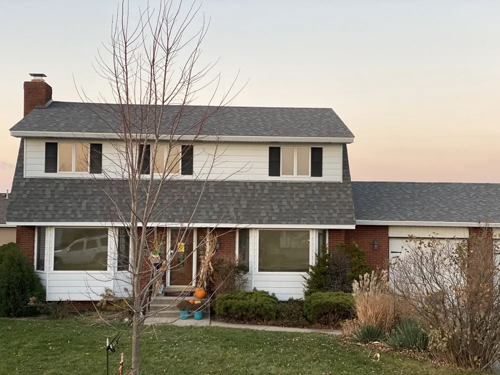 Slide of New Roof Roofing & Restoration