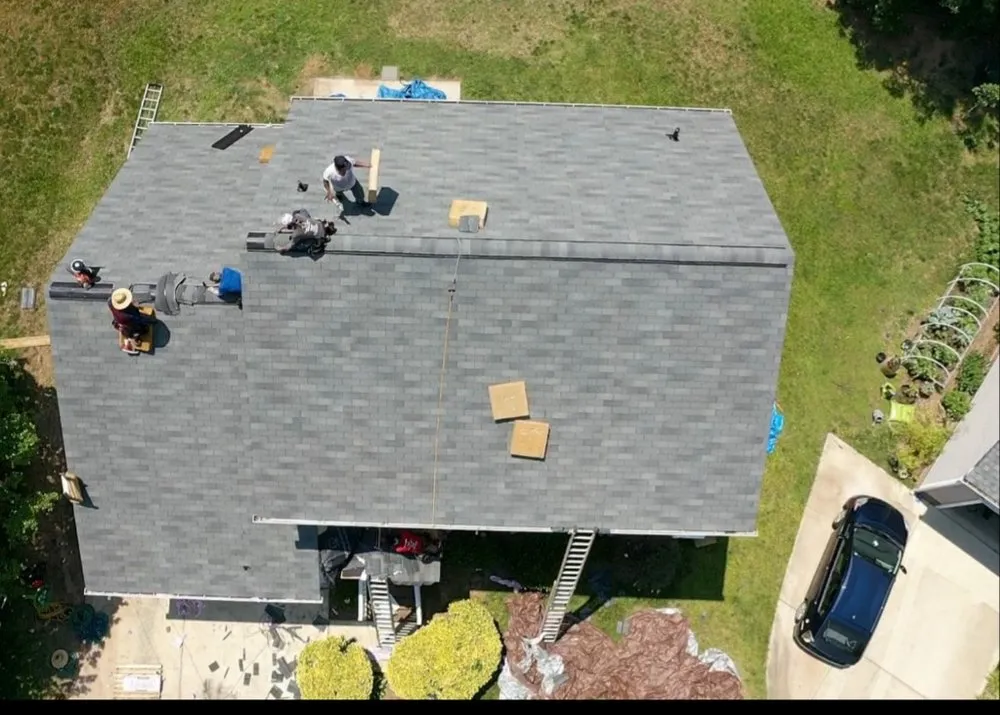 Slide of New School Professional Roofers