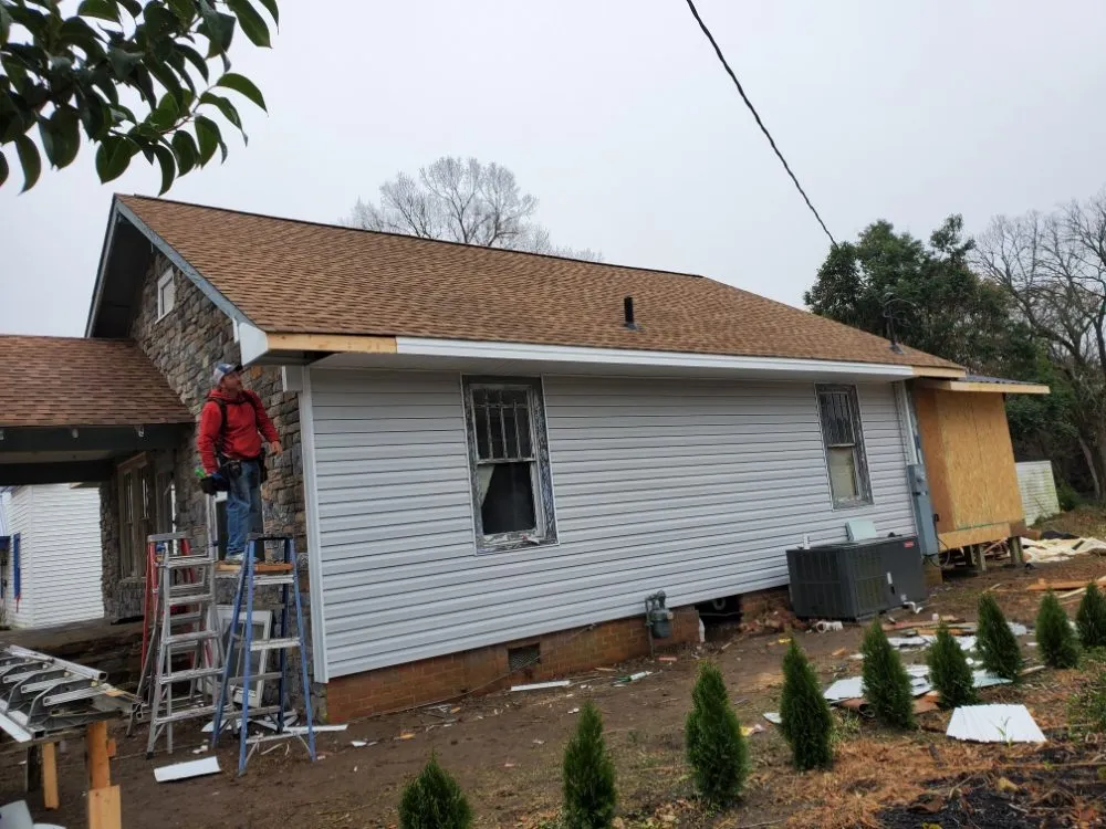 Slide of New School Professional Roofers