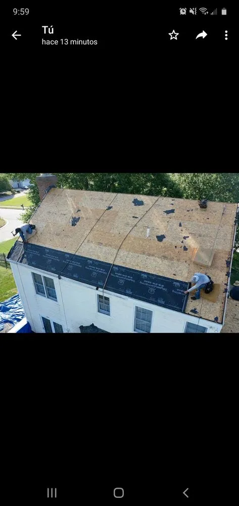 Slide of New School Professional Roofers