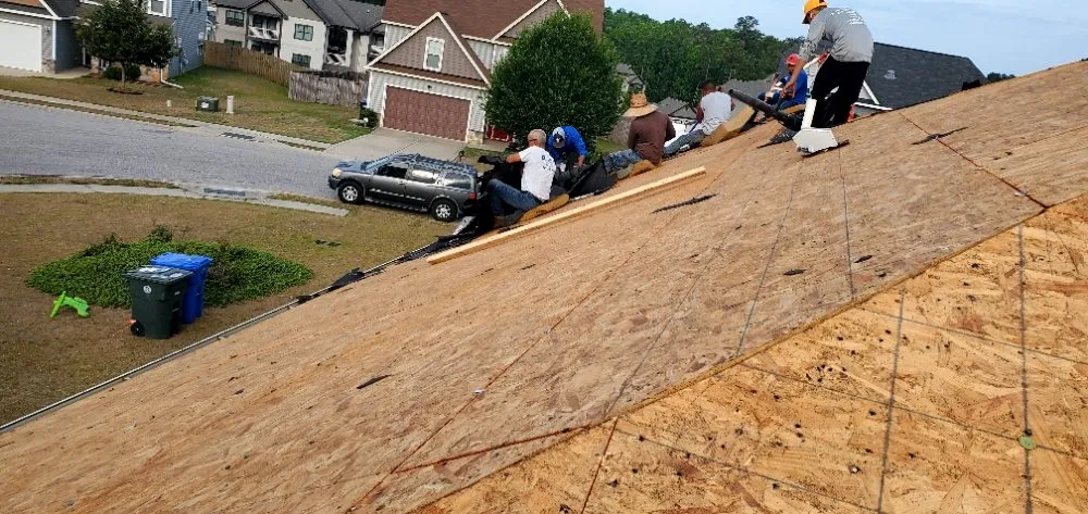 Slide of New School Professional Roofers