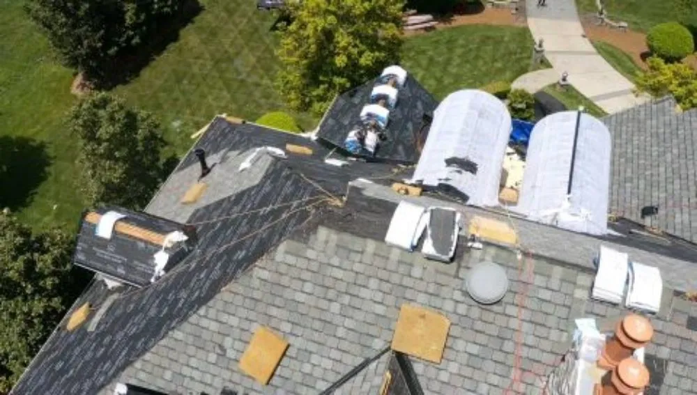 Slide of New School Professional Roofers