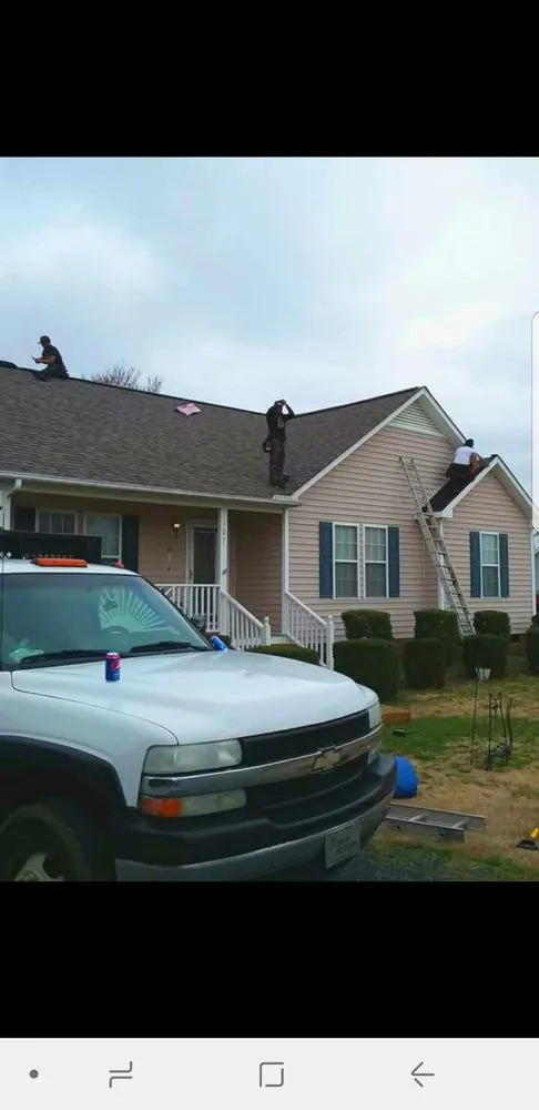 Slide of New School Professional Roofers