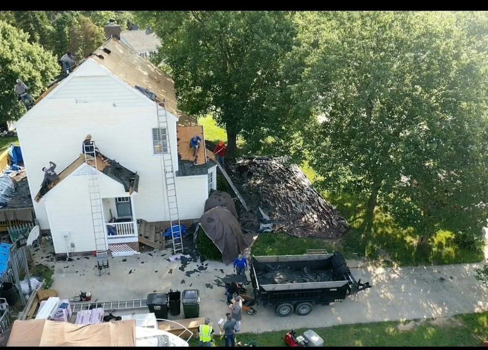 Slide of New School Professional Roofers