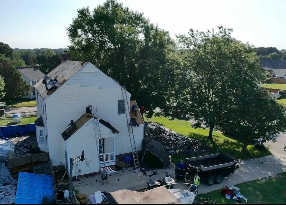Slide of New School Professional Roofers