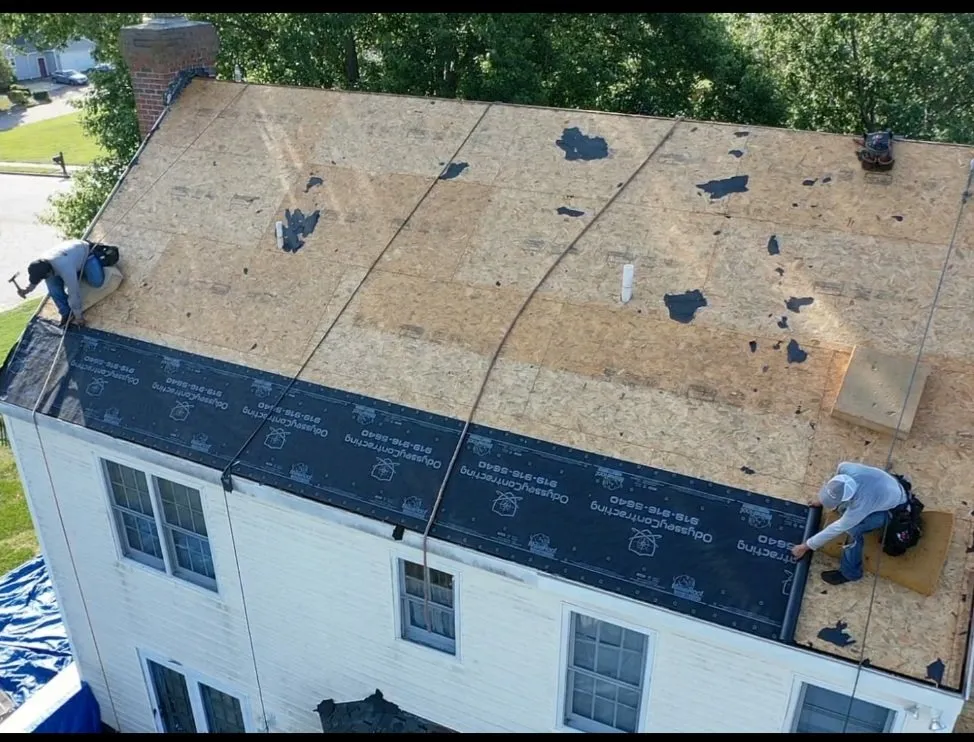 Slide of New School Professional Roofers