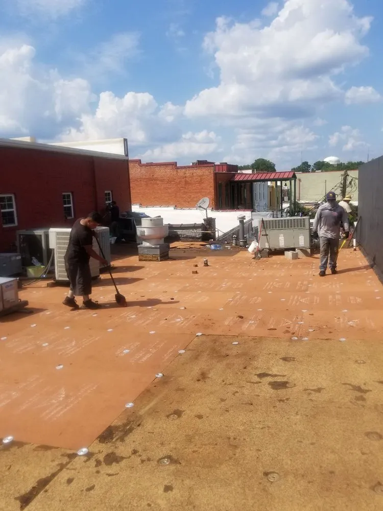 Slide of New School Professional Roofers