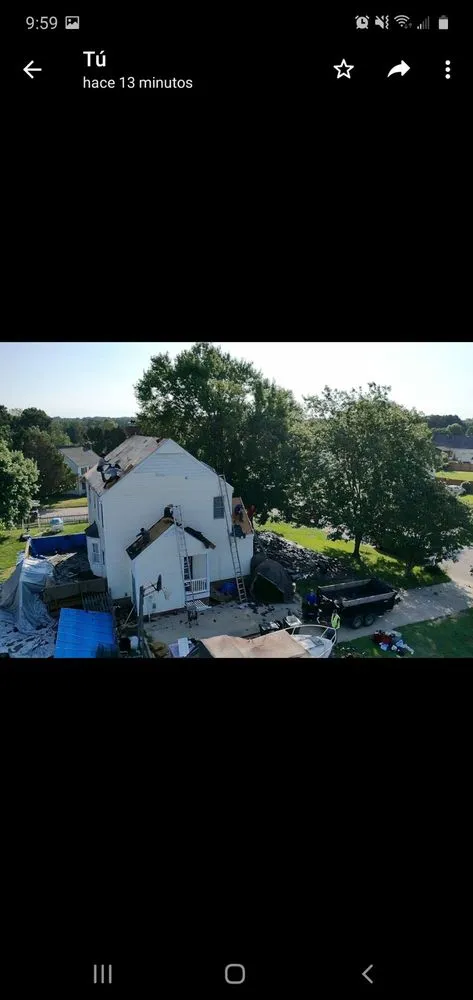 Slide of New School Professional Roofers