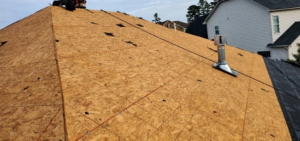 Slide of New School Professional Roofers