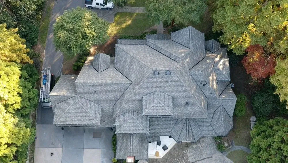 Slide of New School Professional Roofers