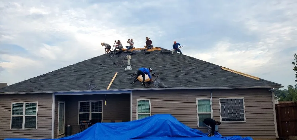 Slide of New School Professional Roofers