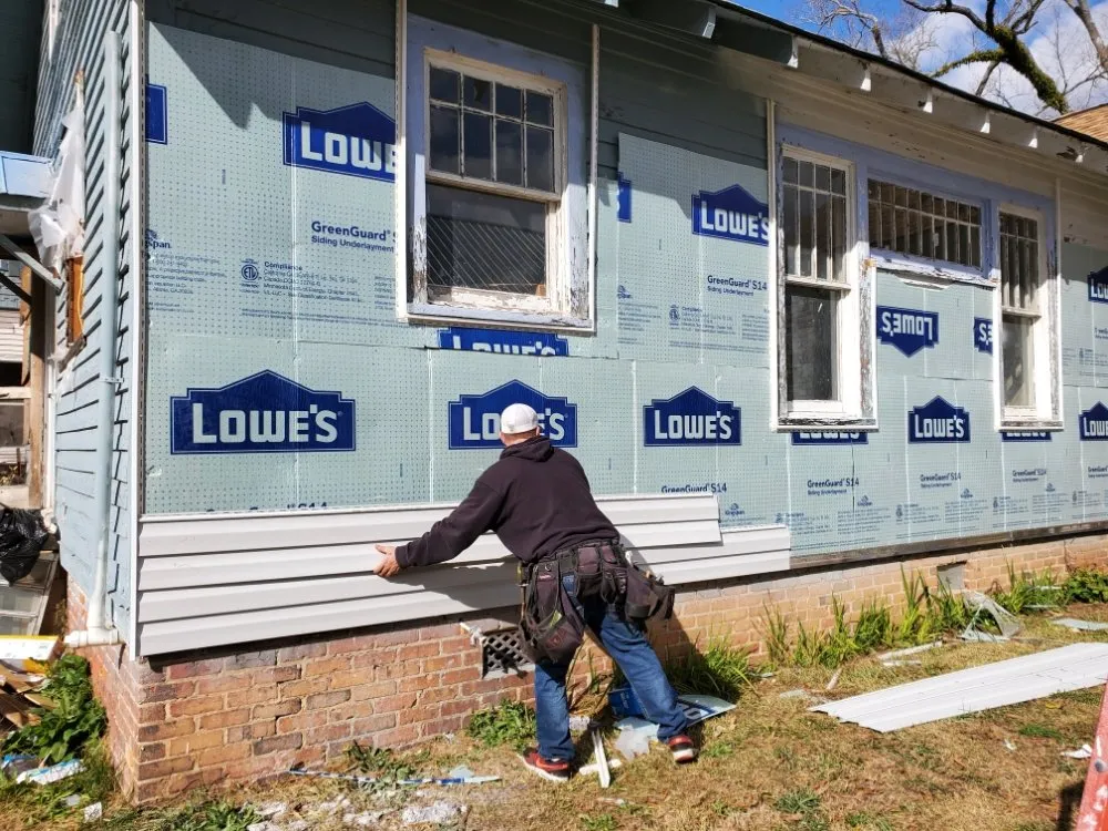 Slide of New School Professional Roofers