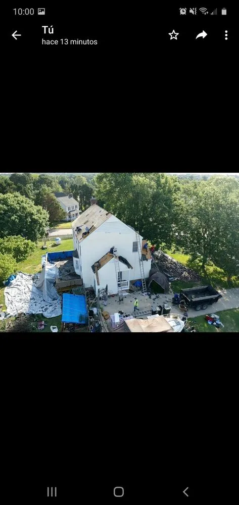 Slide of New School Professional Roofers