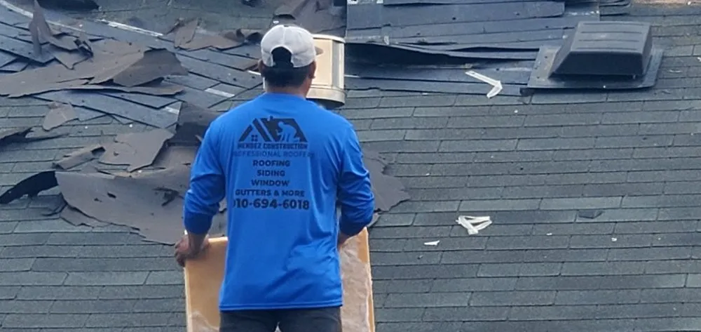 Slide of New School Professional Roofers