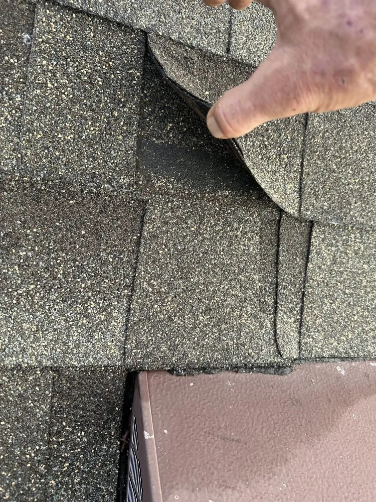 Slide of New Vallee Roofing