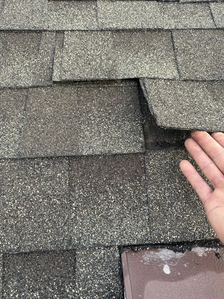 Slide of New Vallee Roofing