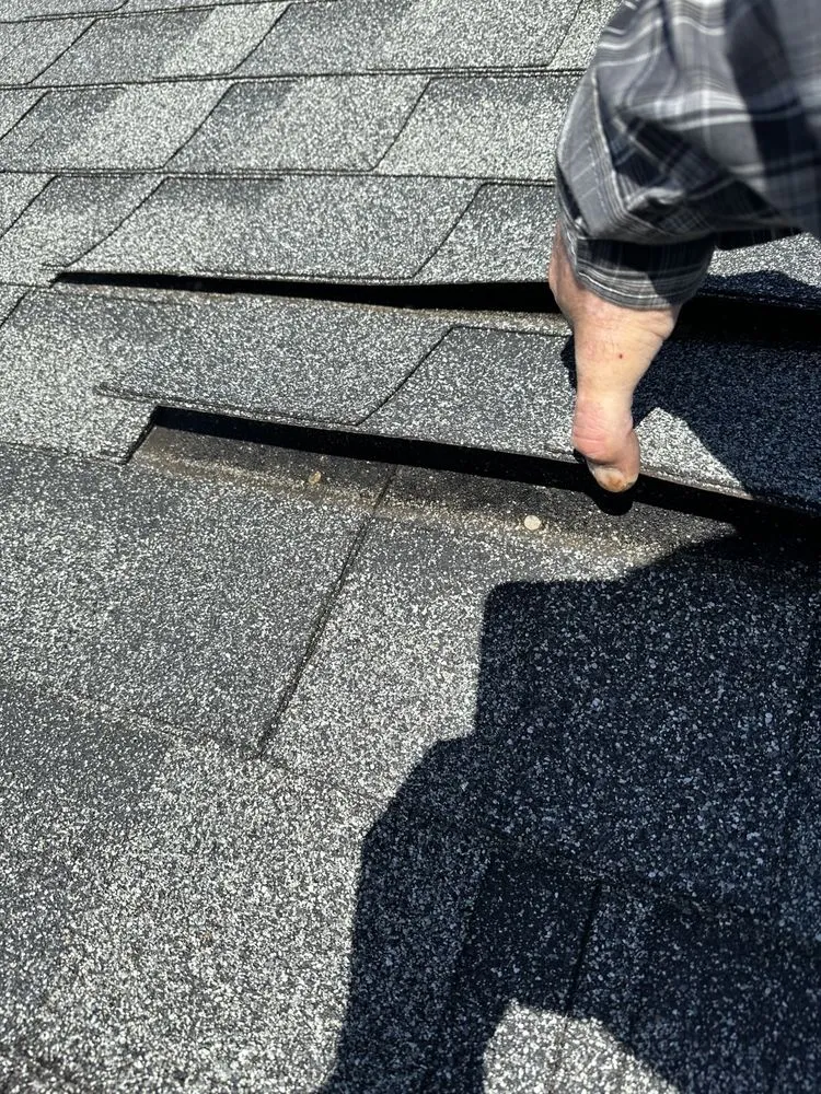 Slide of New Vallee Roofing