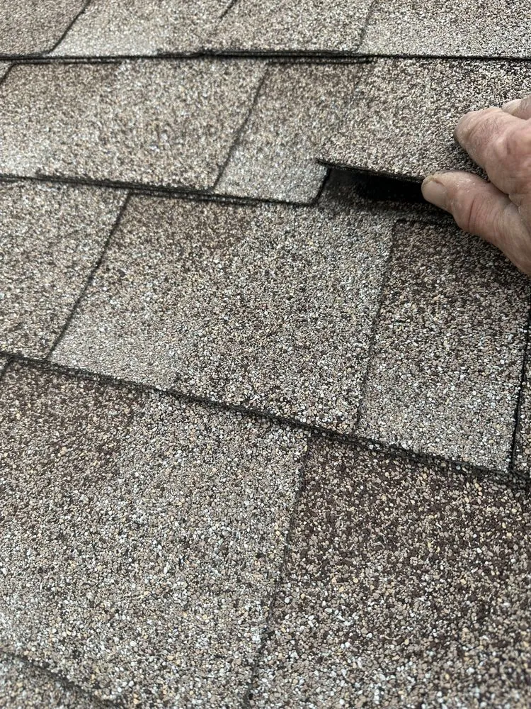 Slide of New Vallee Roofing