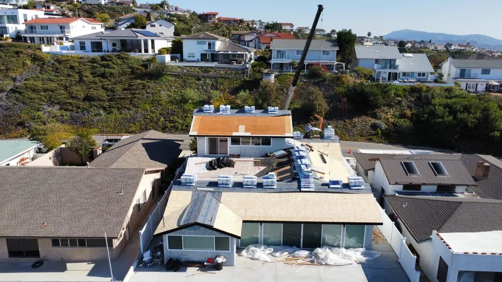 Slide of New Village Roofing