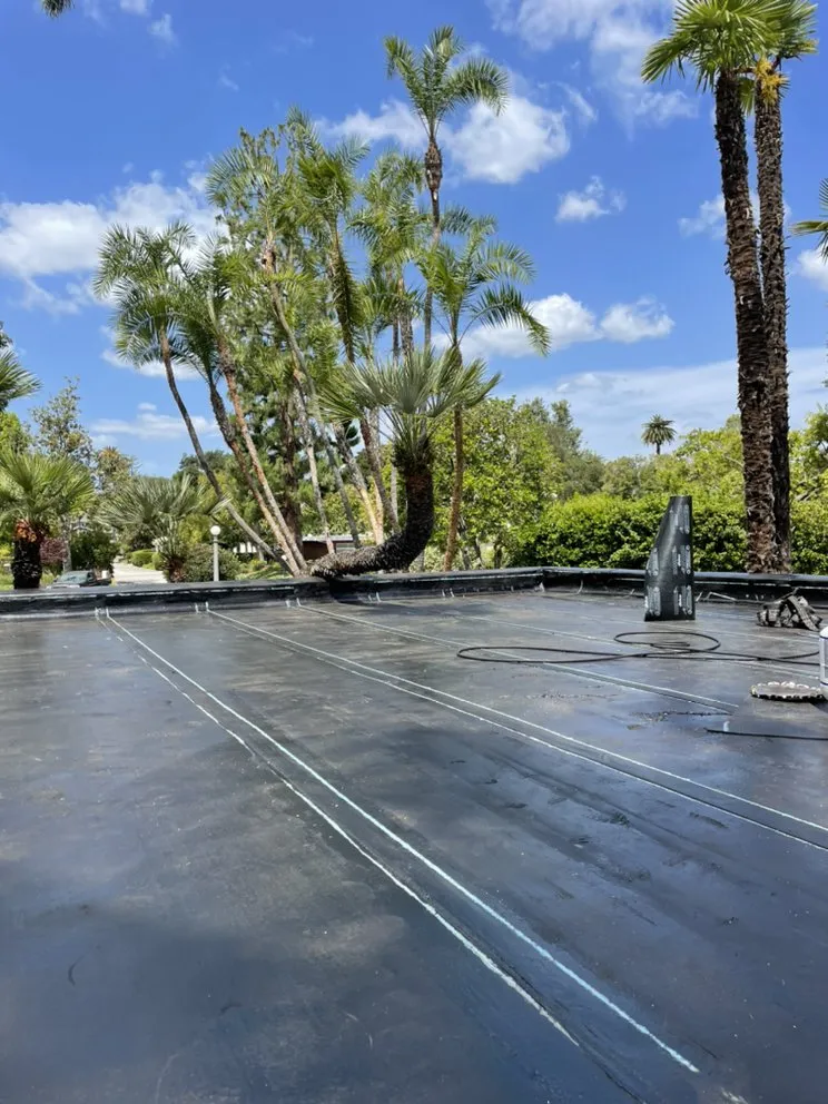 Slide of New Village Roofing