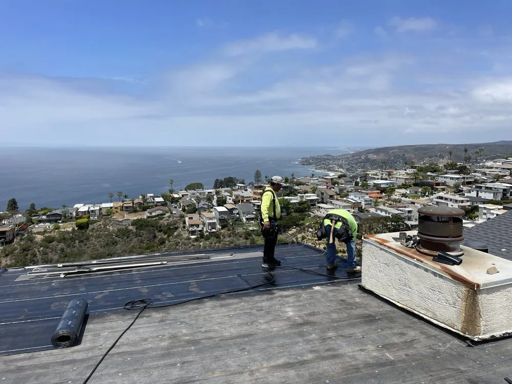 Slide of New Village Roofing