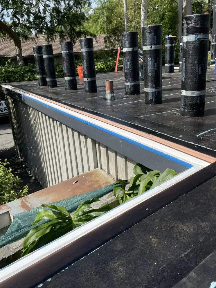 Slide of New Village Roofing