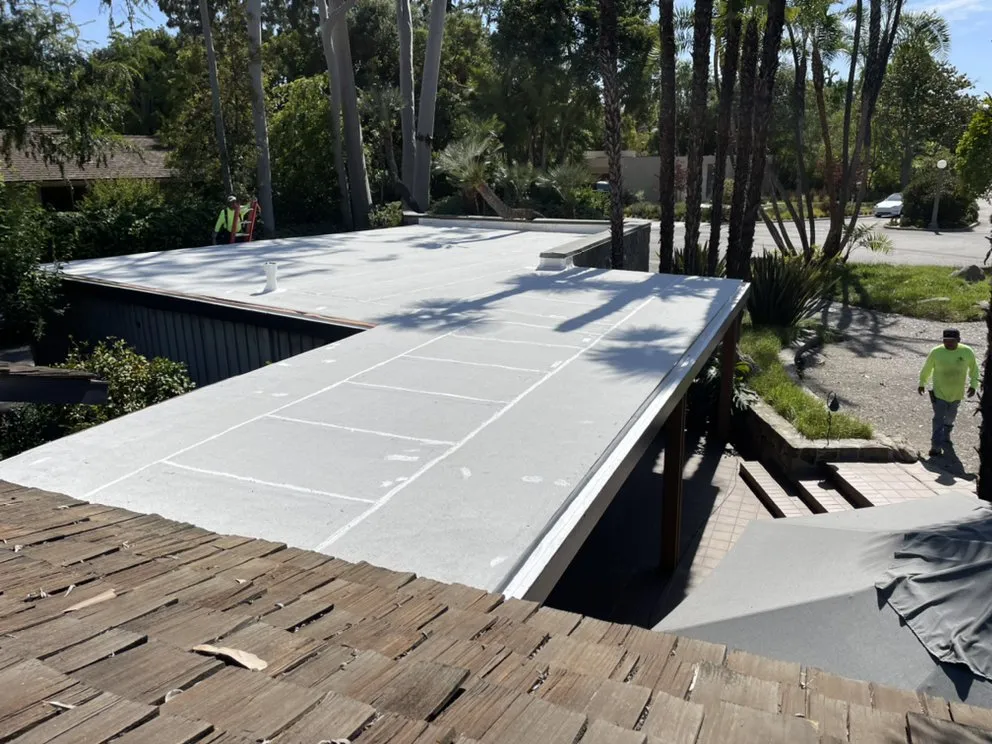 Slide of New Village Roofing