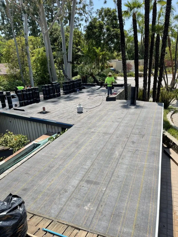 Slide of New Village Roofing