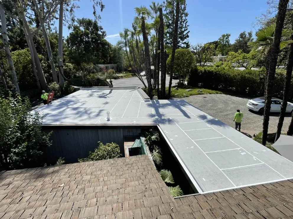 Slide of New Village Roofing