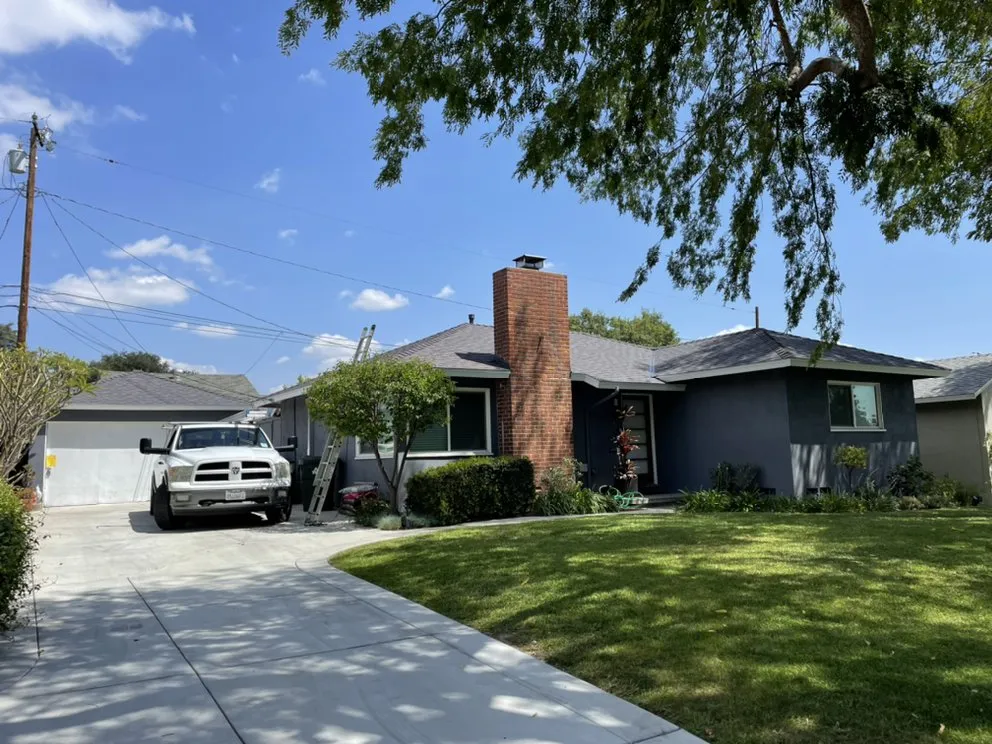 Slide of New Village Roofing