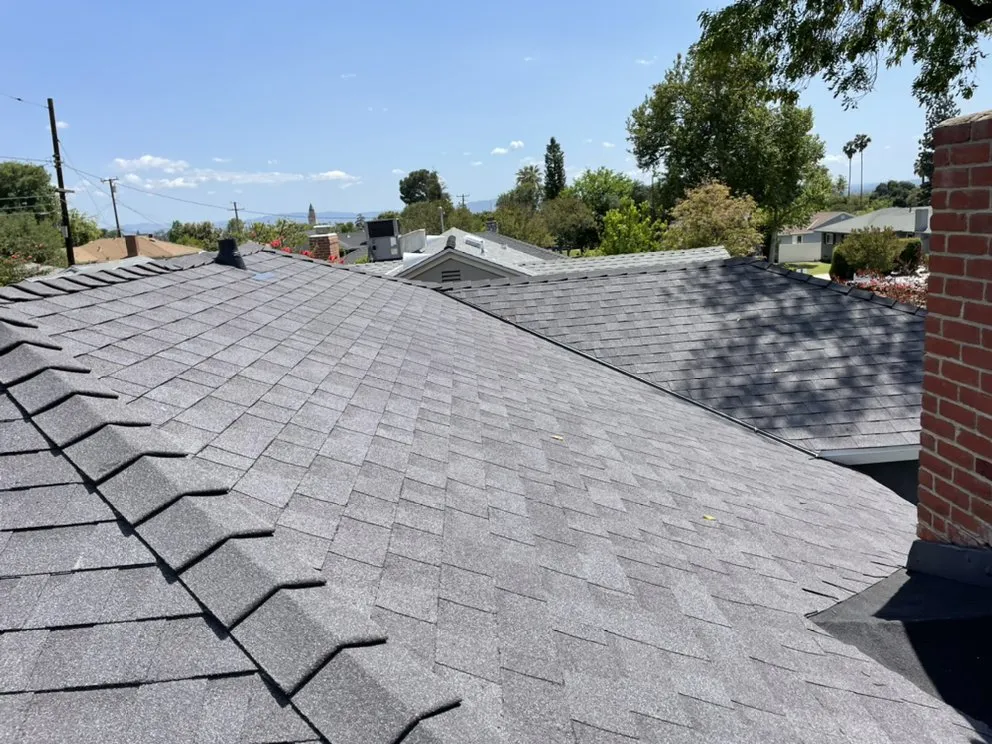 Slide of New Village Roofing