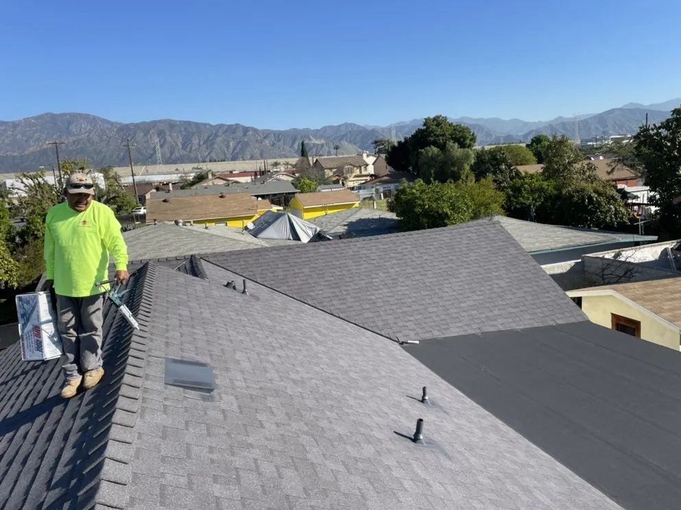 Slide of New Village Roofing