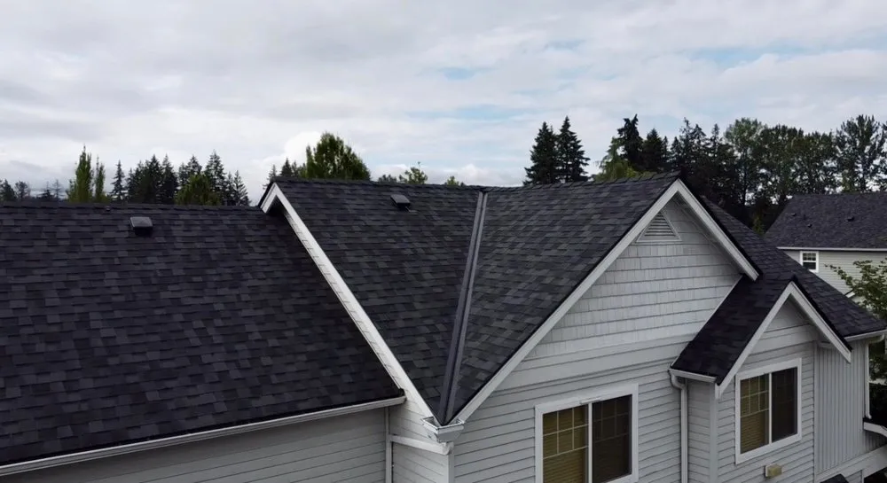 Slide of New World Roofing